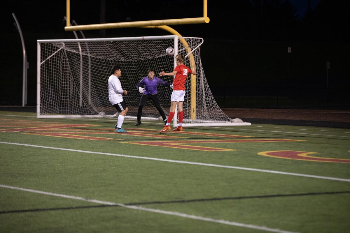 Junior Ian Brinkhaus completes a successful header to win a point for Steilacoom.