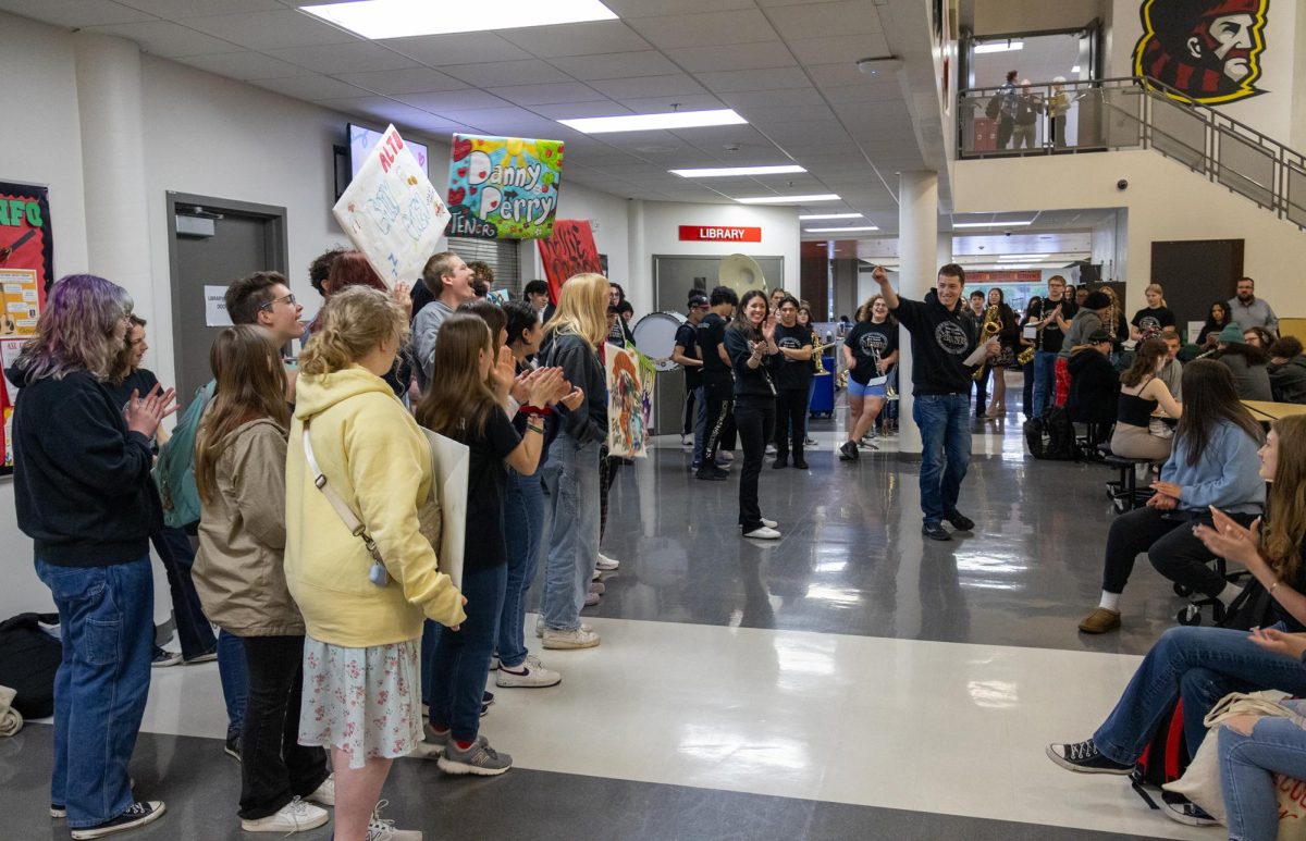Band and Music are celebrated during a morning pep assembly as they prepare to head to the state competition.